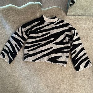 Size small sweater, brand loveriche
